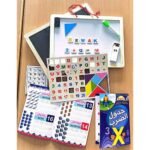 Tableau double face + lettres, chiffres, tangram et 2 livres
