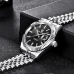 ⁦Montre Homme PAGANI DESIGN Automatique – Cadran Noir, Lunette Cannelée, Bracelet Jubilé⁩ - الصورة ⁦4⁩