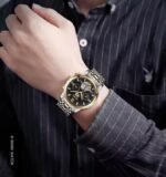 ⁦Montre Homme SKMEI M029 Automatique – Bicolore Or et Argent, Cadran Noir⁩ - الصورة ⁦2⁩