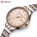 ⁦Montre Femme CURREN 9099 – Cadran Or Rose Soleillé, Couronne de Strass, Bicolore⁩ - الصورة ⁦3⁩
