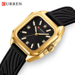 ⁦Montre Femme CURREN 9113 – Cadran Carré Noir et Doré, Bracelet Silicone Noir⁩ - الصورة ⁦2⁩
