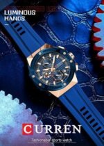 ⁦Montre Homme CURREN 8462 Chronographe – Cadran Bleu, Boîtier Or Rose, Silicone Bleu⁩ - الصورة ⁦2⁩