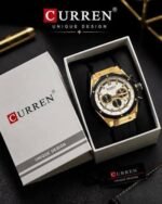 ⁦Montre Homme CURREN 8464 Chronographe – Boîtier Doré, Lunette Noire, Bracelet Silicone Noir⁩ - الصورة ⁦3⁩
