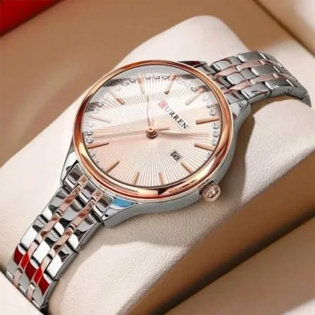 Montre Femme CURREN 9099 – Cadran Or Rose Soleillé, Couronne de Strass, Bicolore