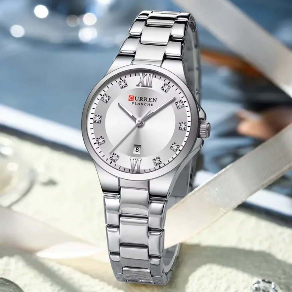 Montre Femme CURREN 9107 – Cadran Argenté Soleillé, Strass et Date, Tout Acier