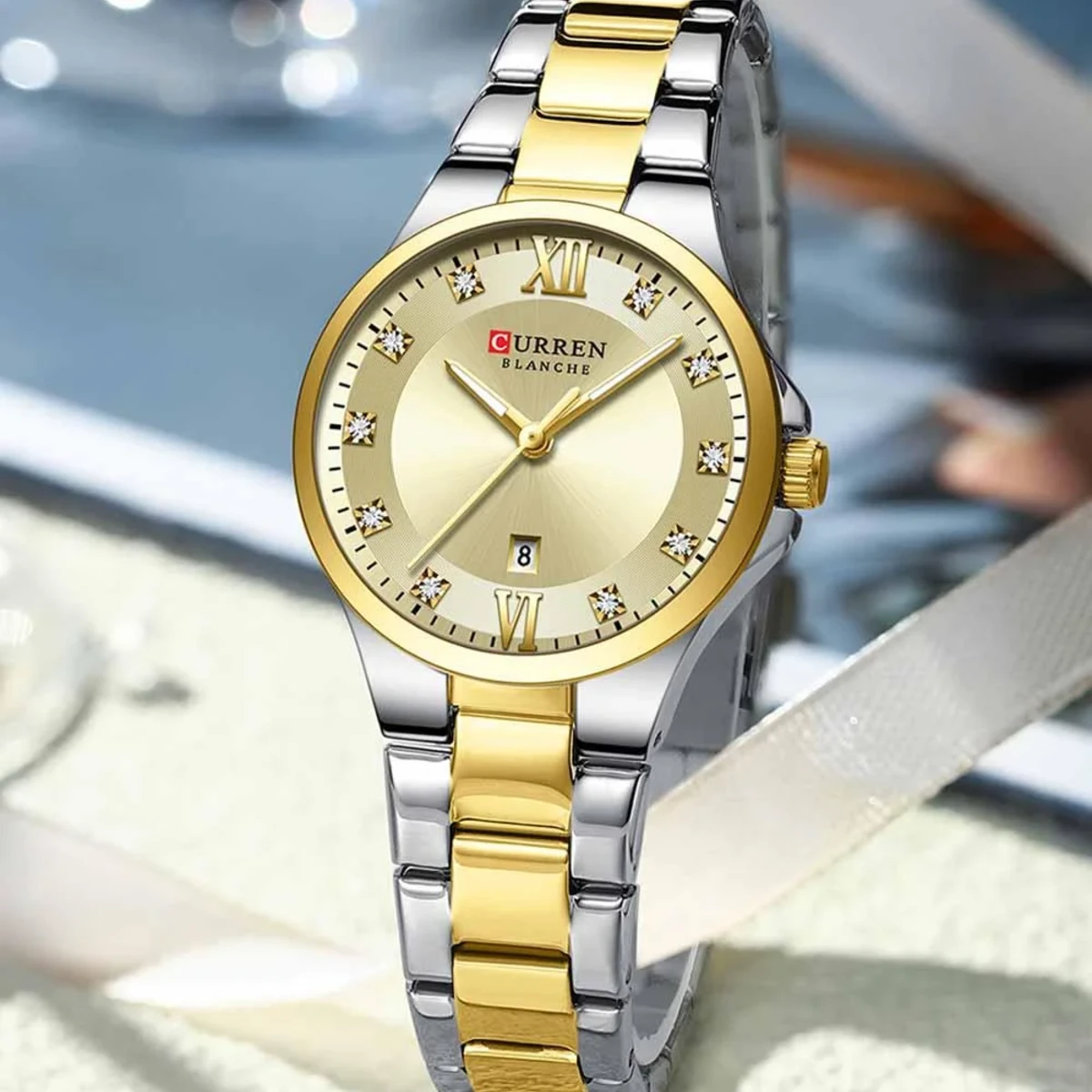 rewak-hd-7069 Montre Femme CURREN 9107 – Cadran Doré Soleillé, Bracelet Bicolore Or et Argent