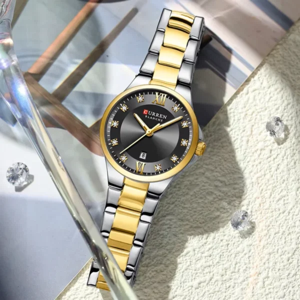Montre Femme CURREN 9107 – Cadran Noir et Lunette Dorée, Bracelet Bicolore