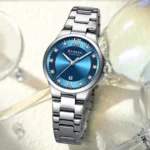 Montre Femme CURREN 9107 – Cadran Bleu Profond, Strass Étoilés, Tout Acier