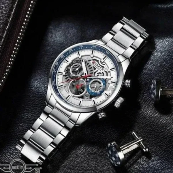 Montre Homme CURREN 8391 Chronographe – Cadran Argenté Ajouré, Lunette Bleue, Acier