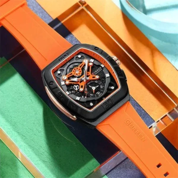 Montre Homme CURREN 8443 – Boîtier Tonneau Noir, Bracelet Silicone Orange