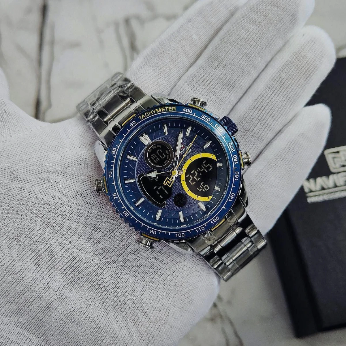 rewak-hd-8233 Montre Homme NAVIFORCE NF9182 Analogique-Digitale – Cadran Bleu, Touches Jaunes, Acier